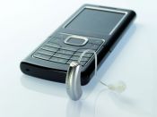 Hörgerät und Mobiltelefon., Grossansicht öffnen
